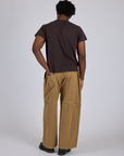 Back view of Drop Pocket Cargo Pants in Desert Brown and espresso brown Organic Vintage Tee on Isaac