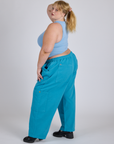 Side view of Drop Pocket Cargo Pants in Hawaiian Blue and baby blue Racerback Tank on Juliet