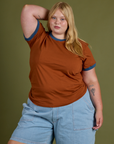 Juliet is 5’7” and wearing L Vintage Ringer Tee in Burnt Terracotta