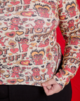 Long Sleeve Baby Tee in Hot Stuff Print close up on Juliet