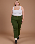 Organic Work Pants in Evergreen and vintage tee white Cropped Tank on Juliet