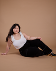 Carpenter Jeans in Black and Cropped Tank in Vintage Tee White on Ashley