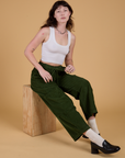 Corduroy Drop Pocket Cargo Pants in Evergreen and Cropped Tank in Vintage Tee White worn by Alex