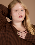 Long Sleeve Baby Tee in Fudgesicle Brown front close up on Juliet