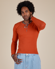Jerrod is 6’3” and wearing S Long Sleeve Baby Tee in Chili Red