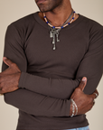 Long Sleeve Baby Tee in Espresso Brown front close up on Jerrod