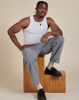 Racerback Tank in Vintage Tee White and washed grey Work Pants on Isaac