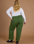 Railroad Denim Work Pants in Gross Green Overdye back view on Juliet