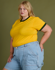 Vintage Ringer Tee in Sunshine Yellow angled view on Juliet