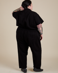 Short Sleeve Jumpsuit in Basic Black back view on Sam