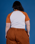 Back view of Produce Raglan Tee in Habanero on Ashley