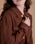 Close up of Ripstop Field Coat in Fudgesicle Brown on Alex
