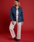 Tiara is 5’4” and wearing S Chain Link Work Jacket paired with White Cami and White Work Pants