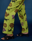 Side view ofPaintstamped Work Pants in Froggy pant leg on Kandia