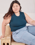 Ashley is wearing Muscle Tee in Lagoon and light wash Carpenter Jeans