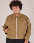 Miguel is 6’0” and wearing 1XL Mechanic Jacket in Desert Brown