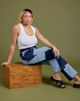 Tiara is wearing Mismatched Denim Carpenter Jeans