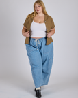 Pantry Button-Up in Desert Brown and light wash Denim Drop Pocket Pants on Juliet