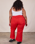 Back view of Western Pants in Mustang Red and Cropped Cami in Vintage Tee Off-White