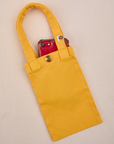 Phone tucked into sunshine yellow Cell Phone Tote