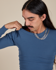 Long Sleeve Baby Tee in French Blue front close up on Anthony