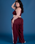 Painted Drop Pocket Cargo Pants in Red Wine angled back view on Ashley