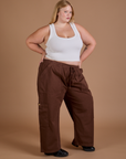 Drop Pocket Cargo Pants in Fudgesicle Brown and Cropped Tank in vintage tee white worn by Juliet
