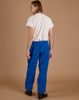 Back view of Heritage Trousers in Royal Blue and Organic Vintage Tee in Vintage Off White