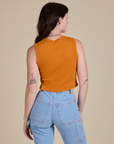 Muscle Tee in Creamsicle Orange back view on Alex