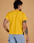 Organic Vintage Tee in Sunshine Yellow back view on Jesse