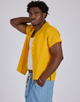 Pantry Button-Up in Sunshine Yellow angled front view on Isaac