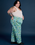 Side view of Winter Floral Print Work Pants and Tank Top in Vintage Tee Off-White on Sam