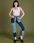 Alex is 5'8" and wearing XS Mismatched Denim Carpenter Jeans paired with Cropped Tank in Vintage Tee White