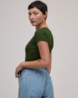 Side view of Baby Tee in Evergreen on Alex