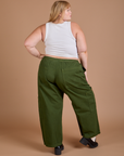 Back view of Drop Pocket Cargo Pants in Evergreen and Cropped Tank in vintage tee white