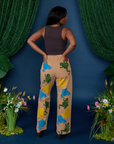 Back view of Paintstamped Work Pants in Froggy and espresso brown Cropped Tank on Kandia