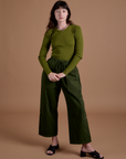 Gingham Long Sleeve Baby Tee in Summer Olive and evergreen Drop Pocket Cargo Pants worn by Alex