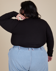 Long Sleeve Baby Tee in Basic Black back view on Sam