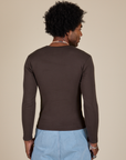 Long Sleeve Baby Tee in Espresso Brown back view on Jerrod
