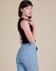 Muscle Tee in Basic Black side view on Alex