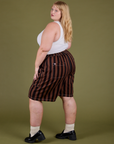 Longline Work Shorts in Fudgesicle Brown angled back view on Juliet