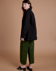 Ripstop Field Coat in Basic Black side view on Alex