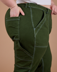 Carpenter Jeans in Evergreen side view close up on Ashley