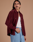 Angled front view of Cropped Corduroy Overshirt in Red Wine on Anthony