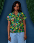 Kandia is wearing a buttoned up Pond Party Pantry Button-Up
