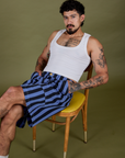 Jesse is wearing Longline Work Shorts in Cornflower and Cropped Tank in Vintage Tee White