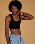 Angled front view of Mini Tank in Basic Black on Jerrod