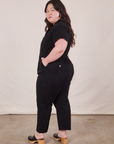 Petite Short Sleeve Jumpsuit in Basic Black side view worn by Ashley