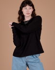 Alex is 5’8” and wearing P Long Sleeve Burly Tee in Basic Black
