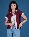 Alex is 5’8” and wearing P Painted Pantry Button-Up in Red Wine